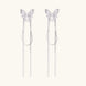 Pair of silver threader earrings with crystal butterfly tops and long chain drops on cream background.