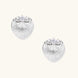 White gold-plated shell-textured stud earrings with three zirconia crystals on ridged surface against cream background.