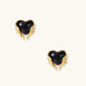 Glossy black heart-shaped studs with gold wing accents on cream background, gothic romantic style earrings