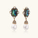Ornate gold-plated drop earrings with rectangular abalone shell centers, crystal accents, and baroque pearl drops