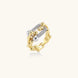 Triple-band gold ring with spherical bead chains and two crystal-pavé bars on cream background