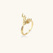 Gold-plated adjustable ring featuring 3D deer head with detailed antlers and cubic zirconia accents on cream background